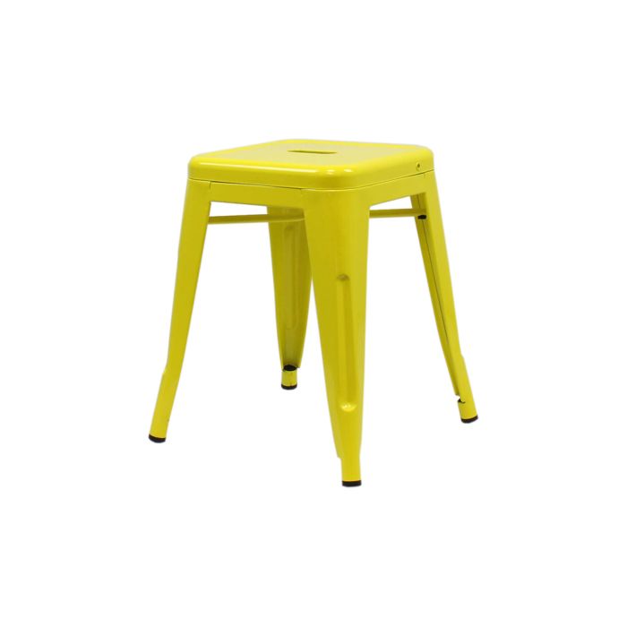 Profile view of yellow Tolix low stool