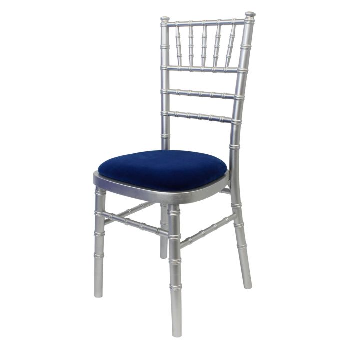 Profile view of silver Chiavari chair with blue pad