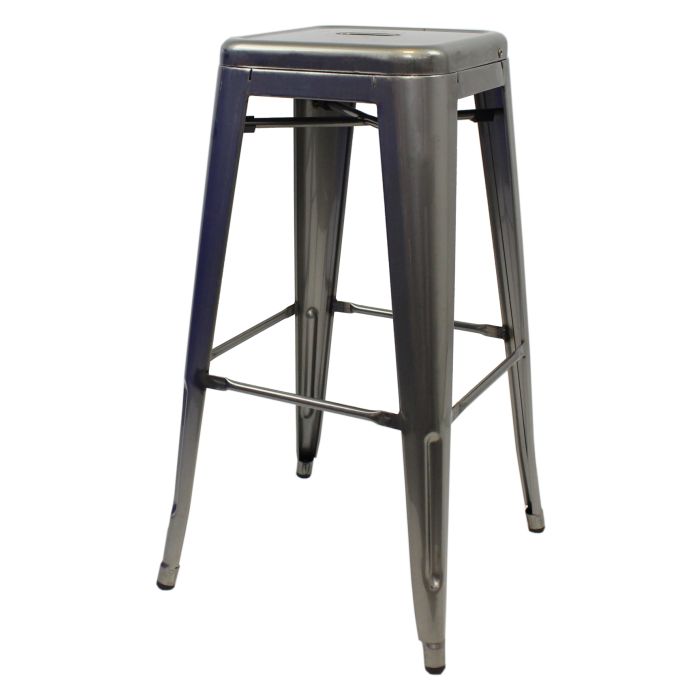 Profile view of industrial grey Tolix bar stool