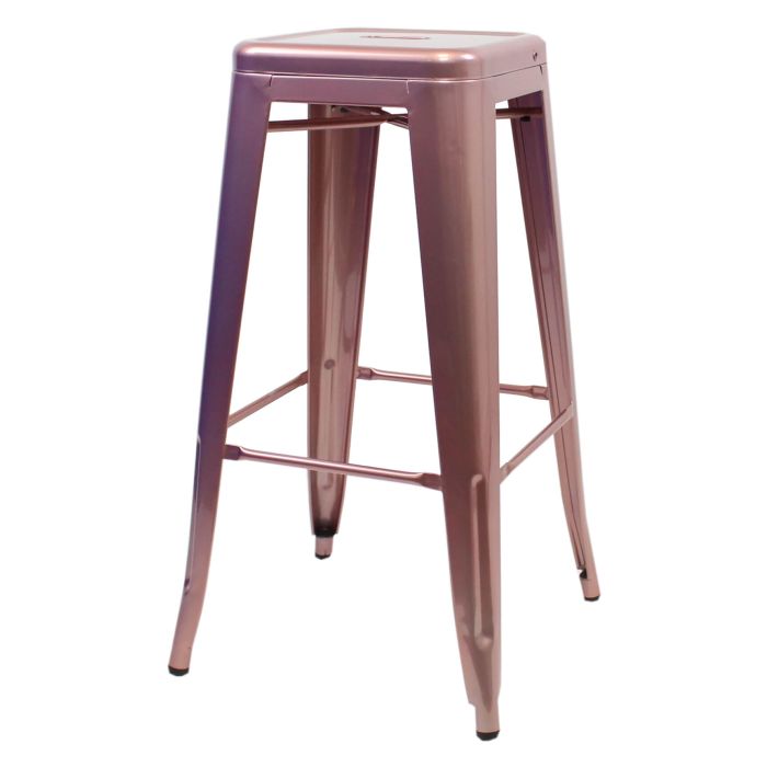 Profile view of rose gold Tolix bar stool