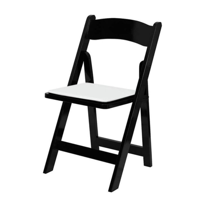 Profile view of black wood folding chair white pad