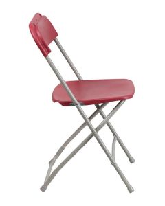 Profile view of burgundy foldaway plastic chair