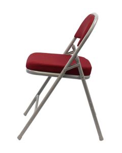 Profile view of red comfort deluxe extra folding steel chair
