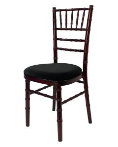 Profile view of mahogany Chiavari chair with black pad