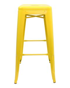 Profile view of yellow Tolix bar stool