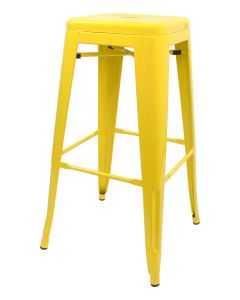Profile view of yellow Tolix bar stool