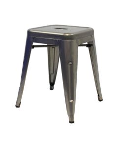 Profile view of industrial grey Tolix low stool