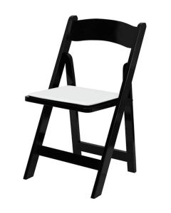 Profile view of black wood folding chair white pad